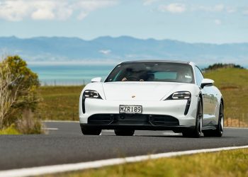 Porsche Taycan driving front view