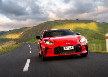 Toyota GR86 front view driving on road