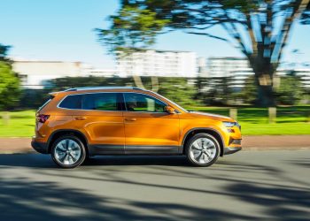 2022 Skoda Karoq TSI 110 Style driving past trees