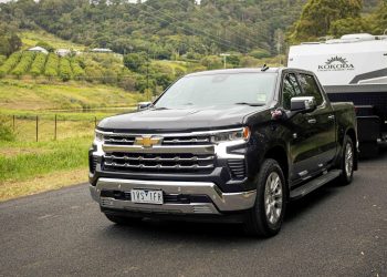 2023 Chevrolet Silverado LTZ Premium towing caravan on country road