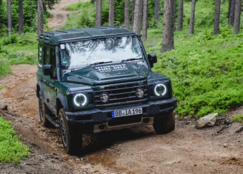 Hydrogen fuel cell Ineos Grenadier driving through forest