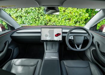 Model 3 cabin in front of bush