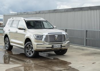 GWM Tank 500 Ultra front quarter shot, next to a puddle