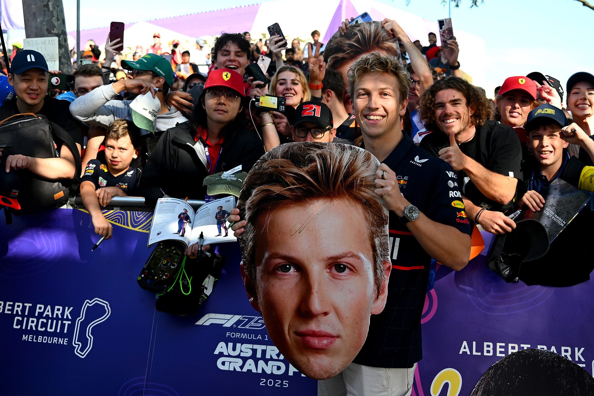 MELBOURNE, AUSTRALIA - MARCH 14: Liam Lawson of New Zealand and Oracle Red Bull Racing meets some fans prior to practice ahead of the F1 Grand Prix of Australia at Albert Park Grand Prix Circuit on March 14, 2025 in Melbourne, Australia. (Photo by Clive Mason/Getty Images) // Getty Images / Red Bull Content Pool // SI202503140010 // Usage for editorial use only //