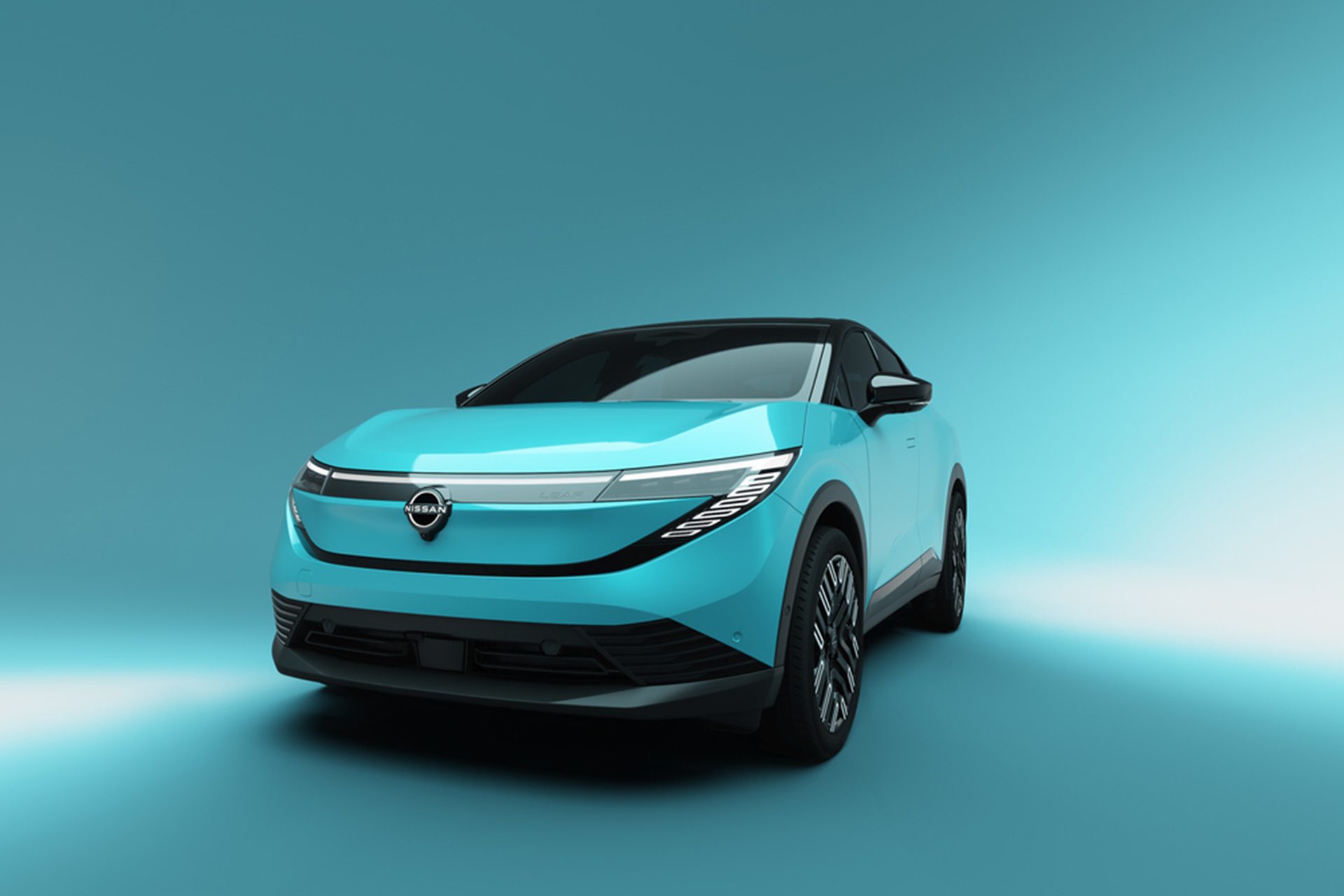 New Nissan Leaf is now an SUV in teal on a teal back drop