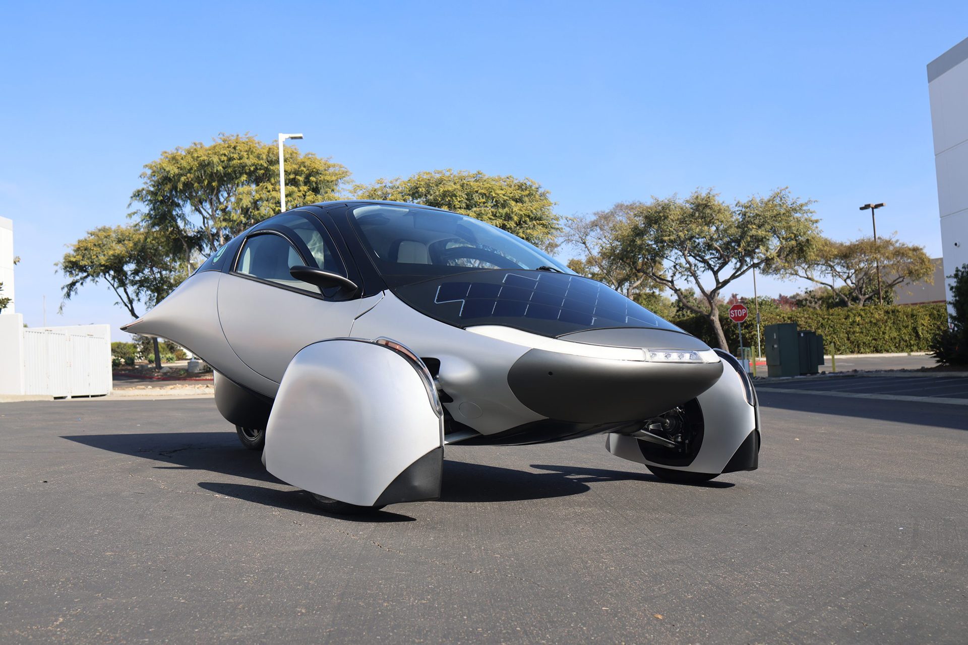 Aptera under blue skies