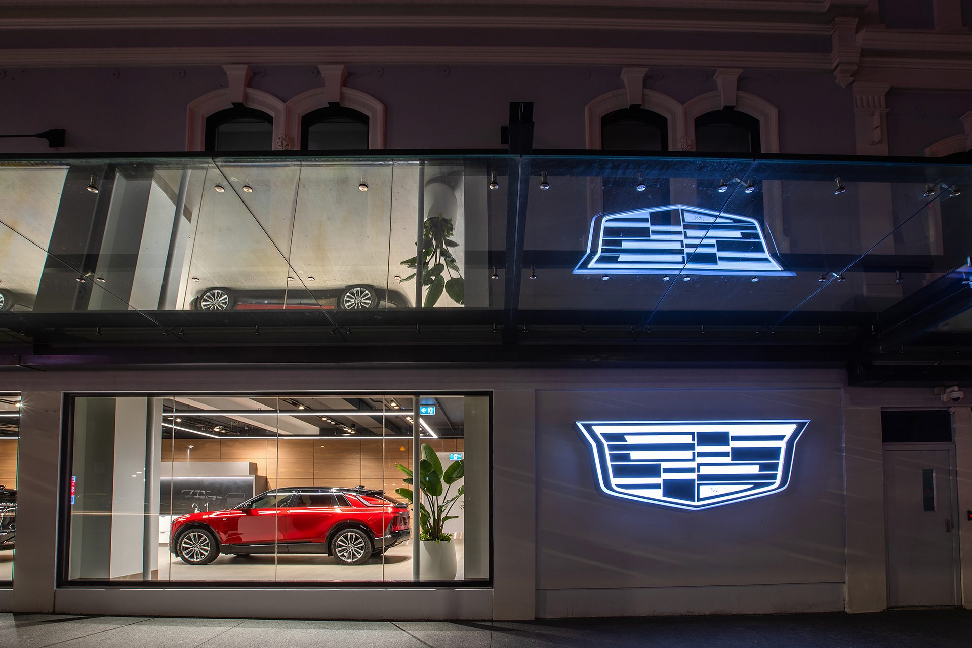 Cadillac Auckland Experience Centre with Cadillac badge on wall