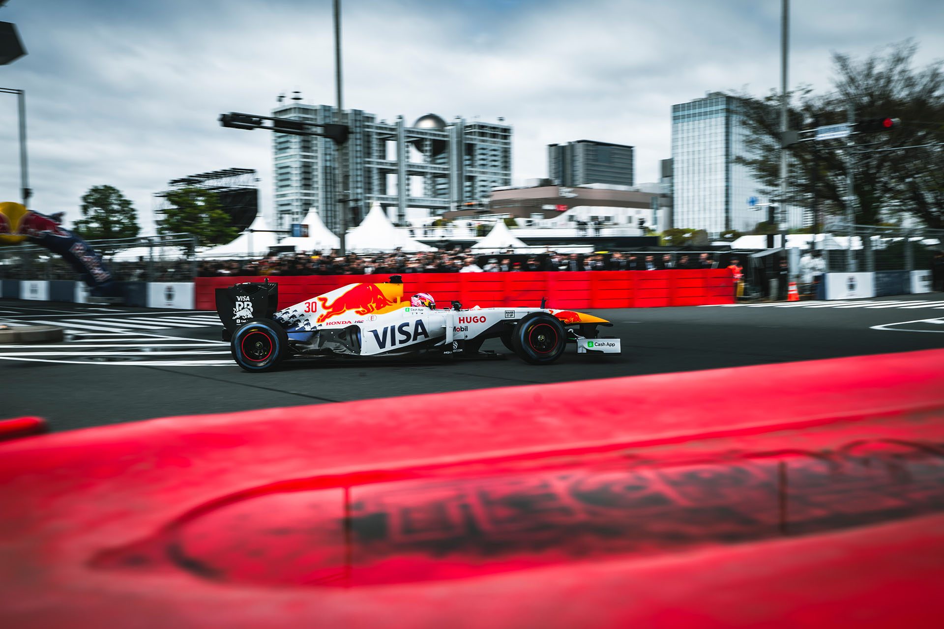 Liam Lawson with RB7 and red curbing