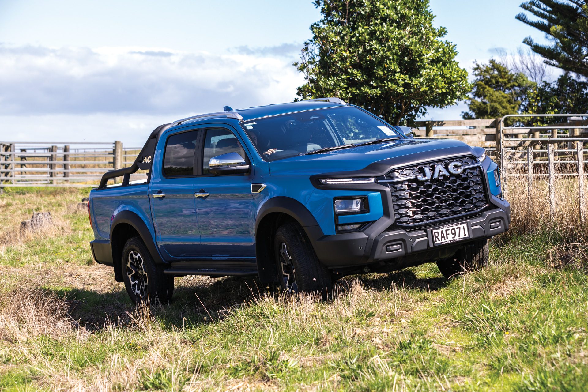 Blue JAC T9 in a paddock