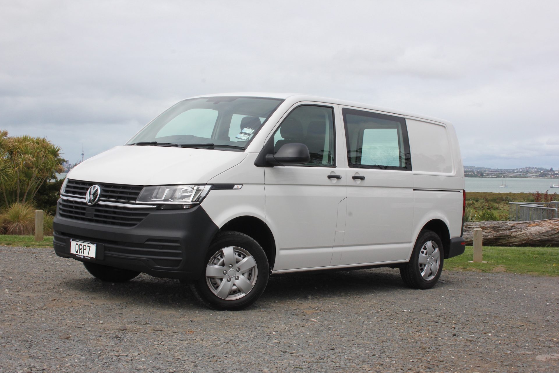 White VW Transporter 6.1 Runner on gravel