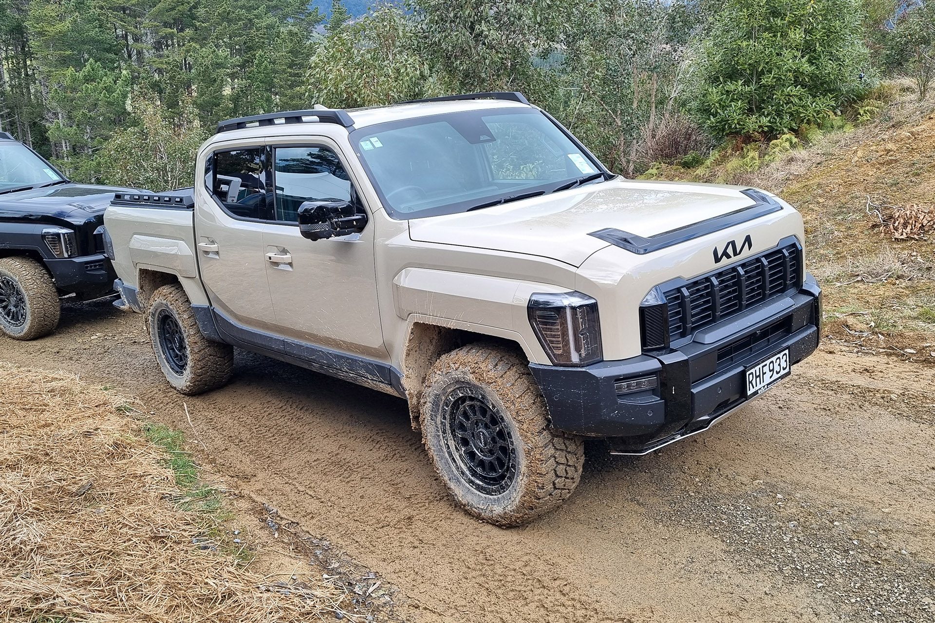 Kia Tasman in the mud