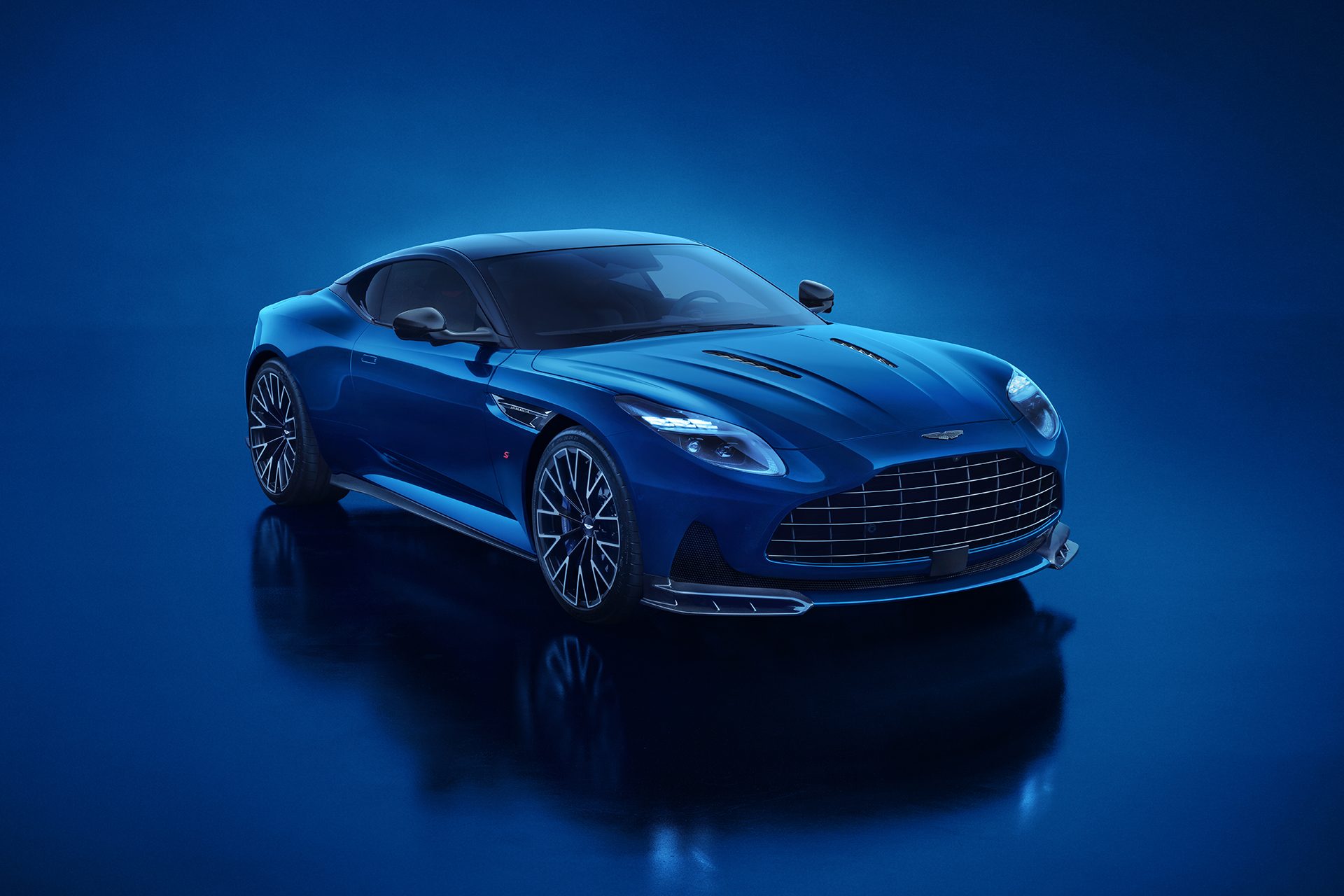 Blue Aston Martin DB12 S on a blue background