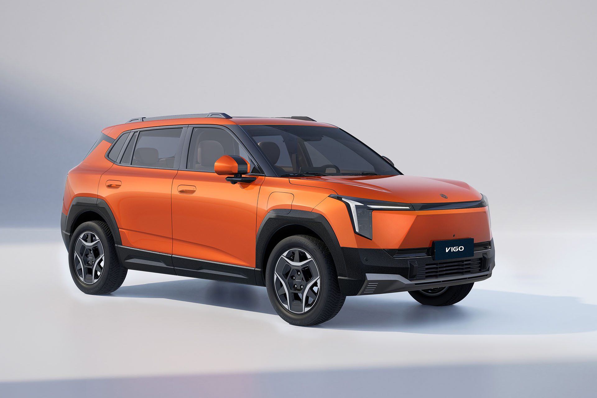 Orange Dongfeng Vigo on a white background